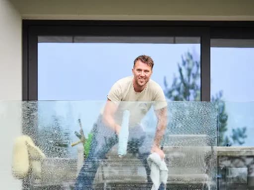 On-location professional window cleaning showing before and after results